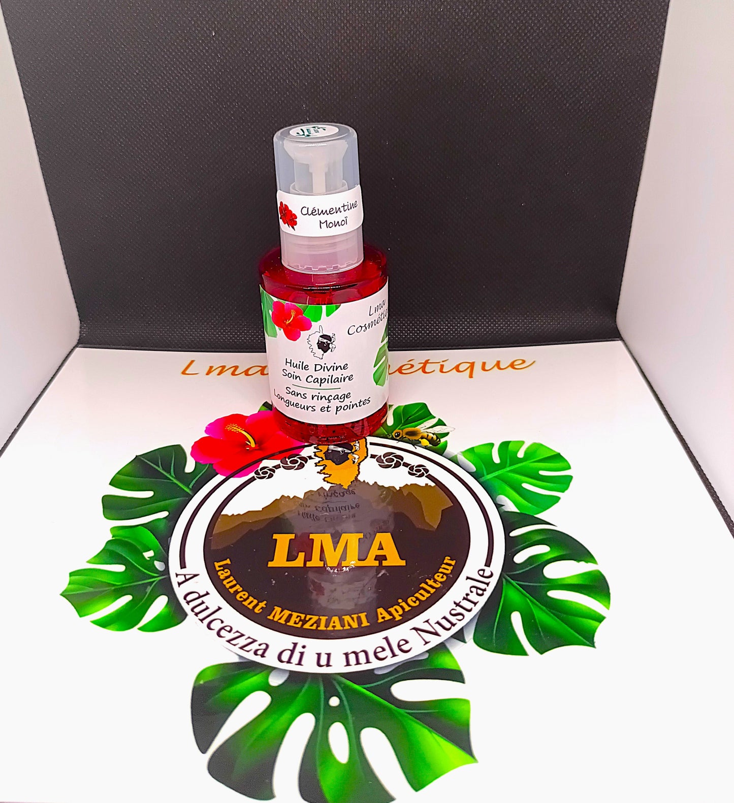 Huile divine soin capillaire parfum pèche monoï.