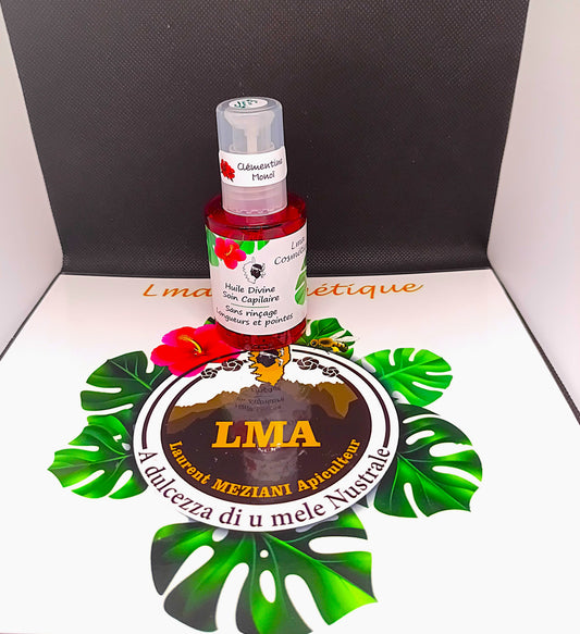 Huile divine soin capillaire parfum pèche monoï.